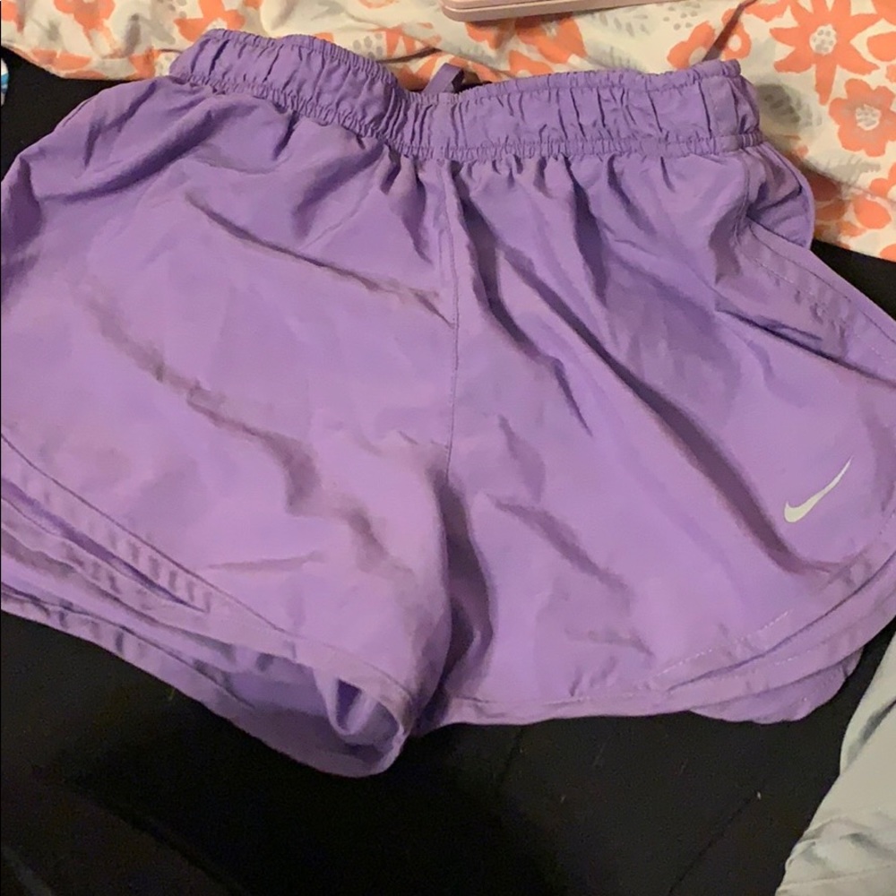 Purple Nike shorts